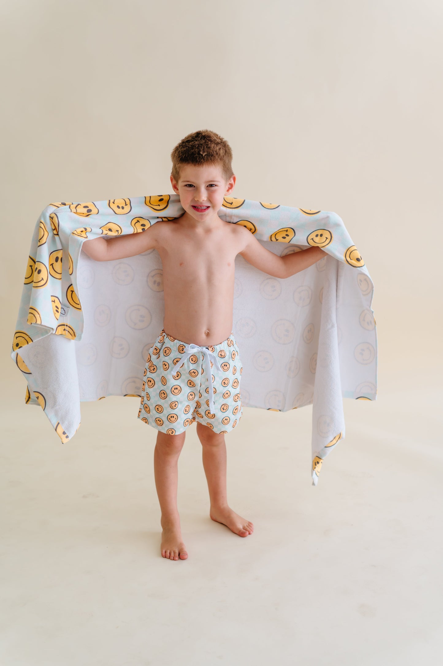 BE HAPPY CHECKERS DREAM SWIM TRUNKS